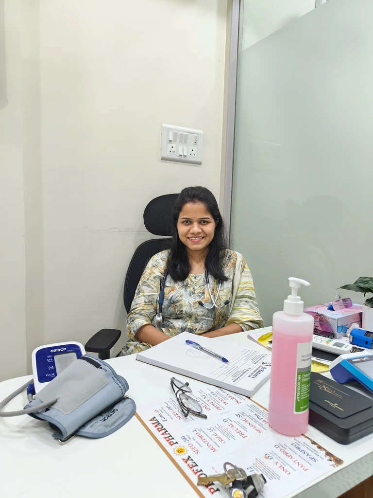 Dr. Bhagyashri Kadam seated in her clinic consultation room